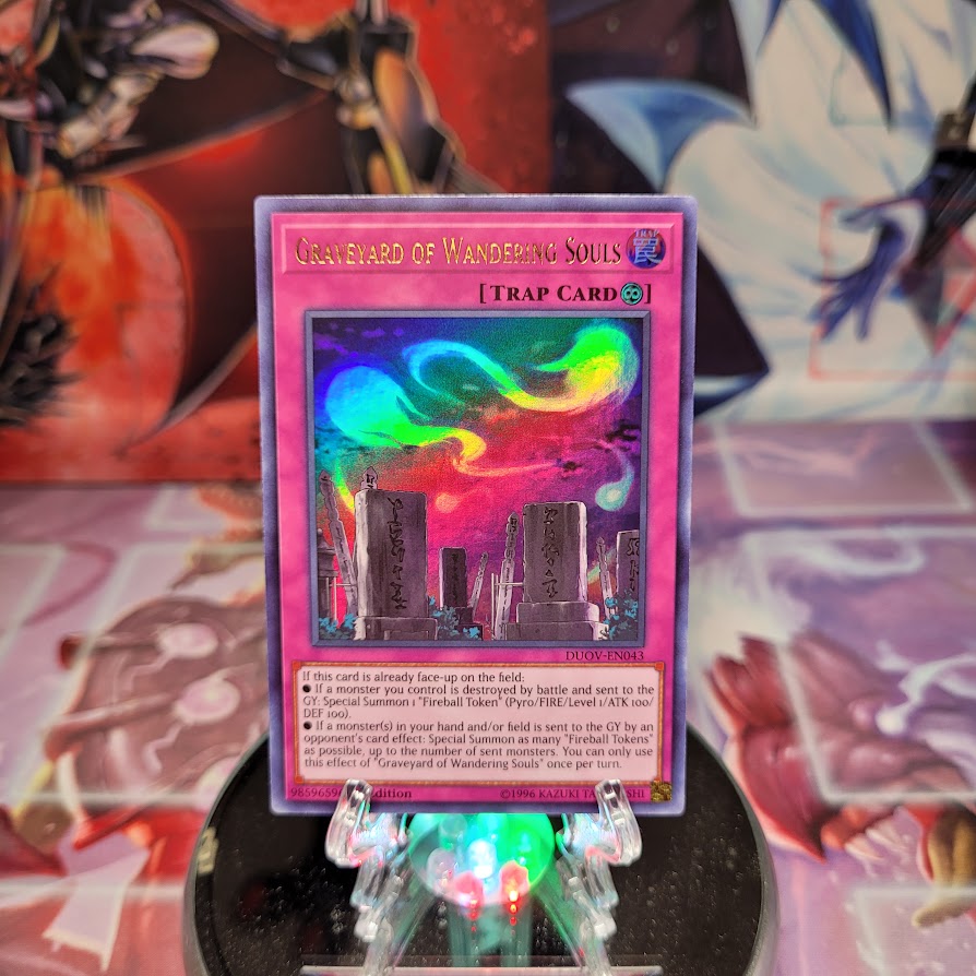 An Ultra Rare "Graveyard of Wandering Souls" card from the Yugioh Set: Duel Overload (DUOV).