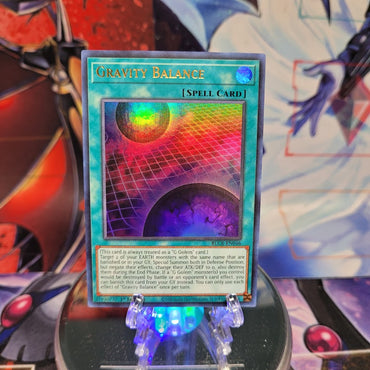 An Ultra Rare "Gravity Balance" card from the Yugioh Set: Battles of Legend: Crystal Revenge.