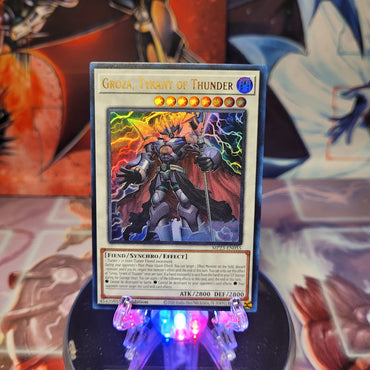 An Ultra Rare "Groza, Tyrant of Thunder" card from the Yugioh 25th Anniversary Tin: Dueling Heroes set.