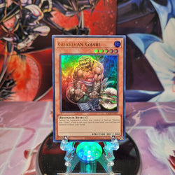 An Ultra Rare "Guardian Grarl" card from the Yugioh Set: Dark Crisis 25th Anniversary Edition.