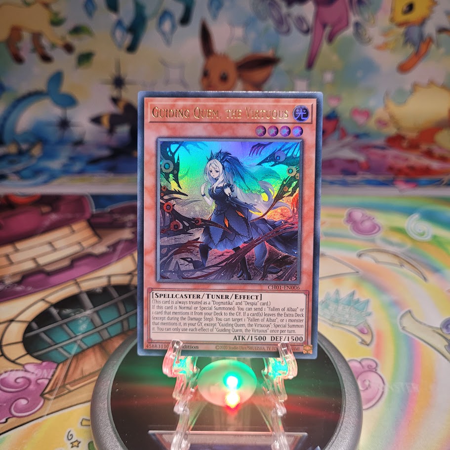 An Ultra Rare "Guiding Quem, the Virtuous" card from the Yugioh Structure Deck: The Fallen & The Virtuous (CH01).