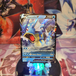 An Ultra Rare "Gyarados V" (028/203) card from the Pokemon Set: Evolving Skies.
