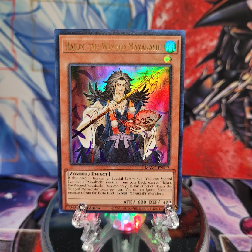 An Ultra Rare "Hajun, the Winged Mayakashi" card from the Yugioh Set: Magnificent Mavens.