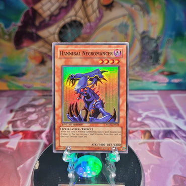 A Super Rare "Hannibal Necromancer" card from the Yugioh Set: Phantom Darkness.