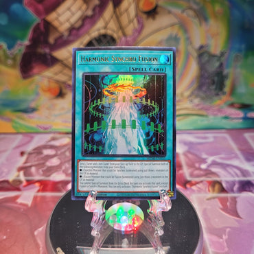 An Ultra Rare "Harmonic Synchro Fusion" card from the Yugioh Set: Maze of Millennia (MZMI).