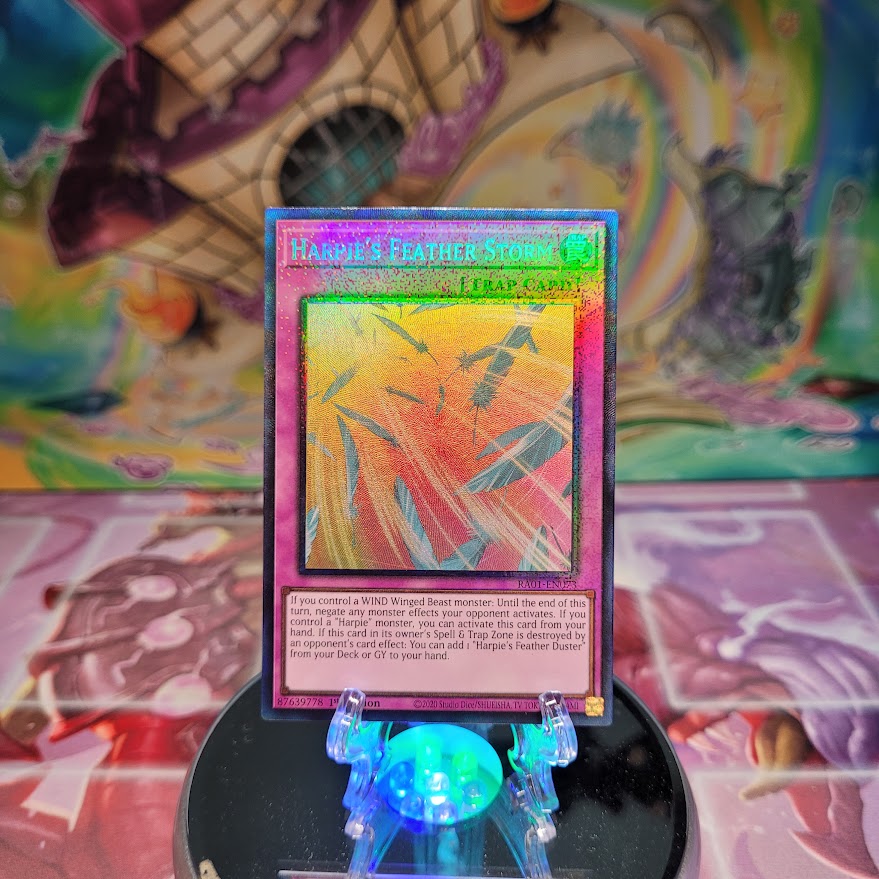 A Prismatic Collector's Rare "Harpie's Feather Storm" card from the Yugioh Set: Rarity Collection 1 (RA01).