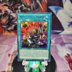 An Ultra Rare Blue "Heavy Metal Raiders" card from the Yugioh Set: Legendary Duelists: Season 1.