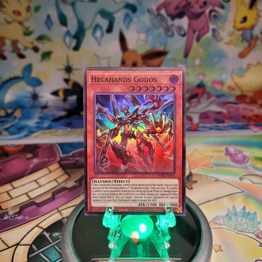A Super Rare "Hecahands Godos" card from the Yugioh Set: Phantom Revenge (PHRE).