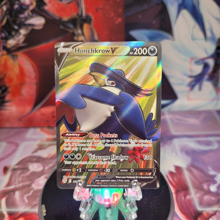 An Ultra Rare "Honchkrow V" (161/172) card from the Pokemon Set: Brilliant Stars.