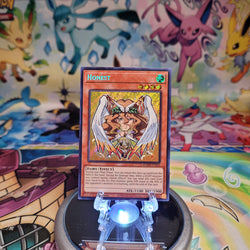 A Secret Rare Chibi Art "Honest" card from the Yugioh Set: Battles of Legend: Monster Mayhem (BLMM).
