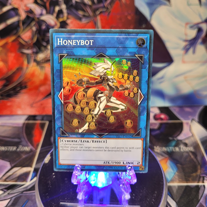 A Super Rare "Honeybot" card from the Yugioh Starter Deck: Link Strike.