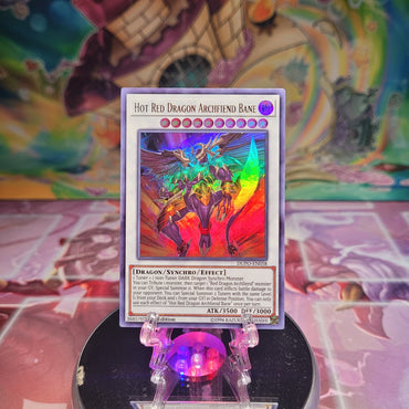 An Ultra Rare "Hot Red Dragon Archfiend Bane" card from the Yugioh Set: Duel Power. 