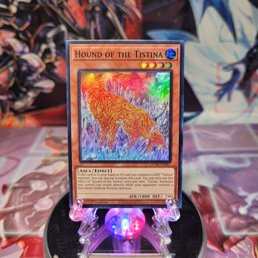 A Super Rare "Hound of the Tistina" card from the Yugioh Set: Duelist Nexus. 