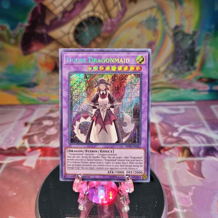 A Secret Rare "House Dragonmaid" card from the Yugioh Set: Mystic Fighters (MYFI).