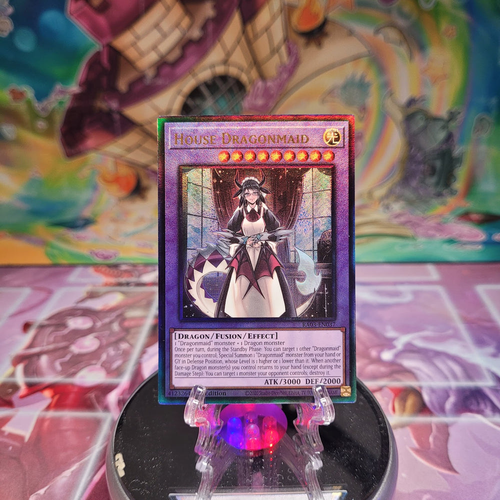 A Prismatic Ultimate Rare "House Dragonmaid" card from the Yugioh Set: Quarter Century Bonanza (RA03).