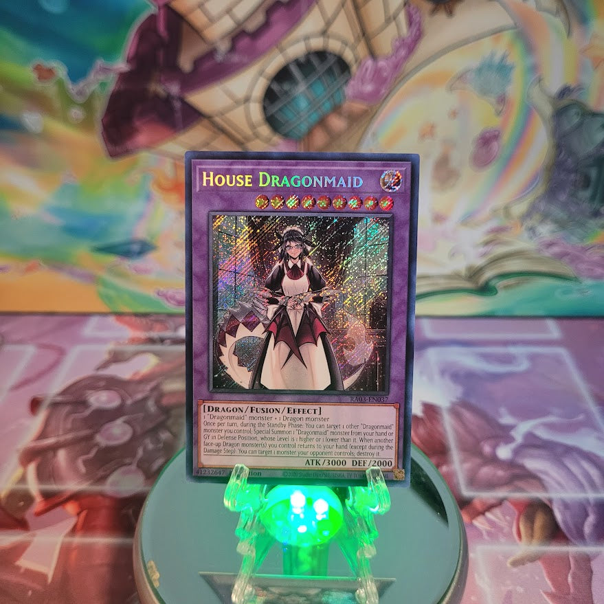  A Secret Rare "House Dragonmaid" card from the Yugioh Set: Quarter Century Bonanza (RA03).