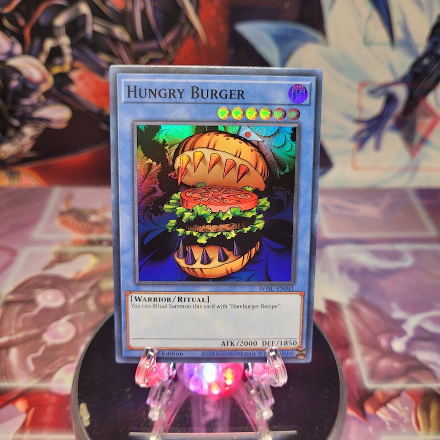 A Super Rare "Hungry Burger" card from the Yugioh Set: Wild Survivors.