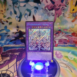 A Secret Rare “Hyperinvoked Aeon” card from the Yugioh Set: Chaos Origins (CORI).