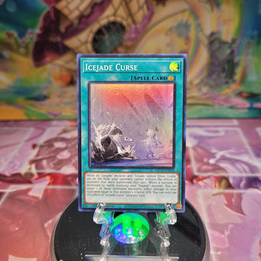 A Super Rare "Icejade Curse" card from the Yugioh 25th Anniversary Dueling Heroes Mega-Tin Mega Pack.