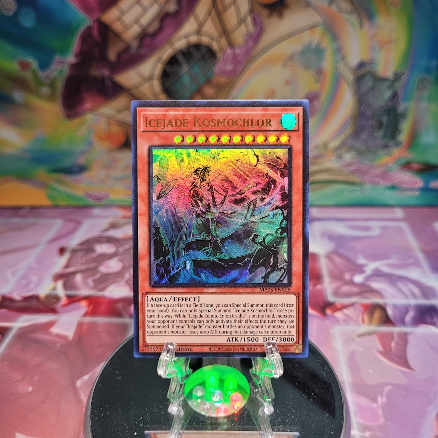 An Ultra Rare "Icejade Kosmochlor" card from the Yugioh Dueling Heroes Mega-Tin Mega Pack.