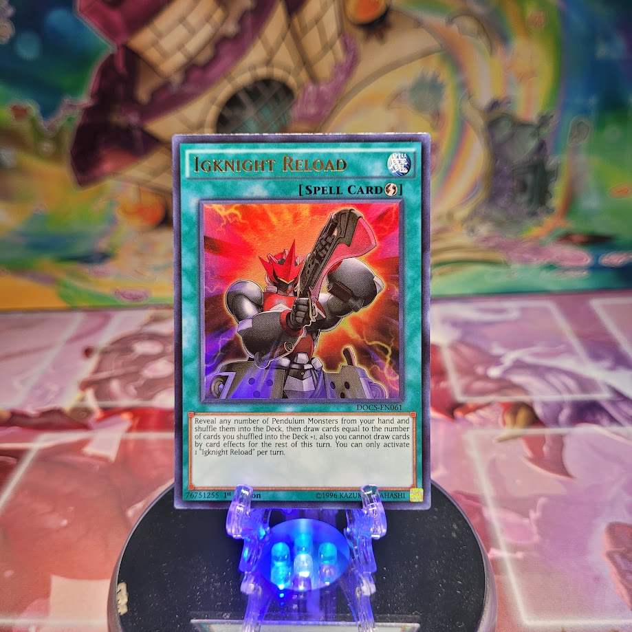 An Ultra Rare "Igknight Reload" card from the Yugioh Set: Dimension of Chaos (DOCS).