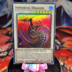  A Super Rare "Immortal Dragon" card from the Yugioh Set: Dimension Force.