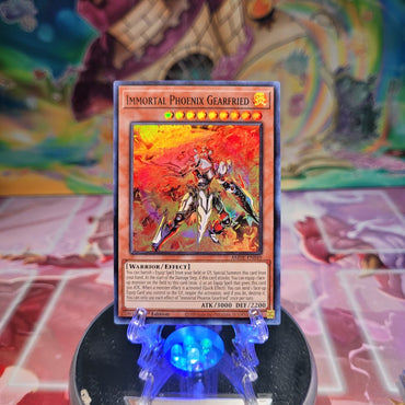 A Super Rare "Immortal Phoenix Gearfried" card from the Yugioh Set: Amazing Defenders.