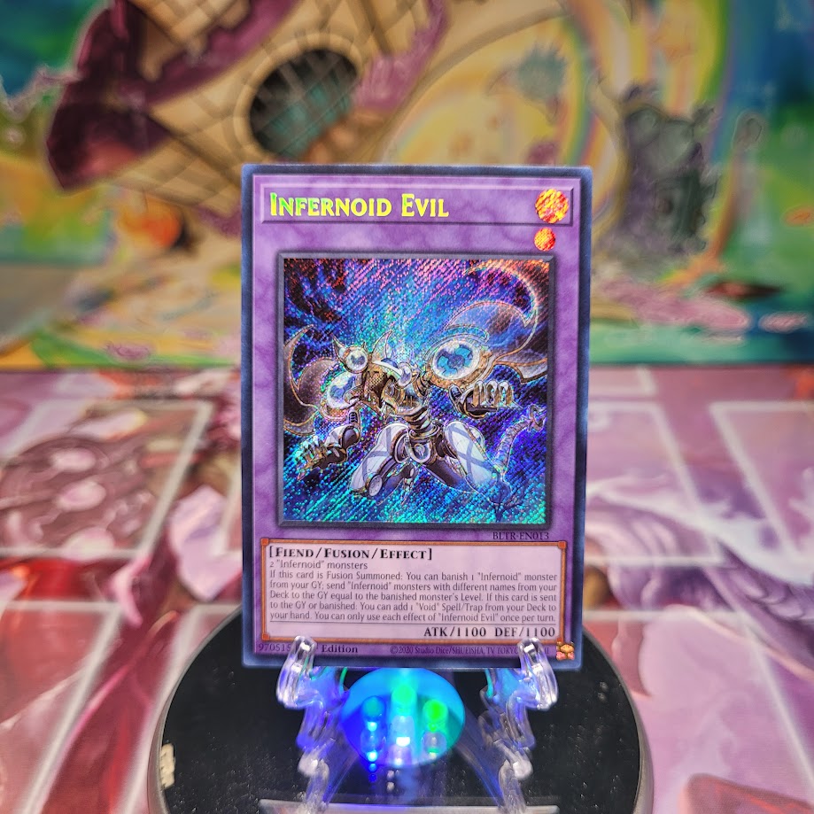 A Secret Rare "Infernoid Evil" card from the Yugioh Set: Battles of Legend: Terminal Revenge.