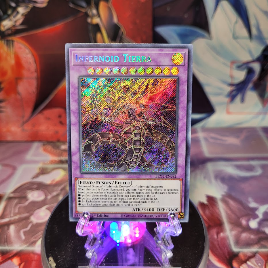 A Secret Rare "Infernoid Tierra" card from the Yugioh Set: Brothers of Legend (BROL).