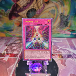 A Secret Rare "Infinite Light" card from the Yugioh Set: Battles of Legend: Relentless Revenge.