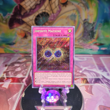 A Secret Rare "Infinite Machine" card from the Yugioh Set: Battles of Legend: Relentless Revenge.