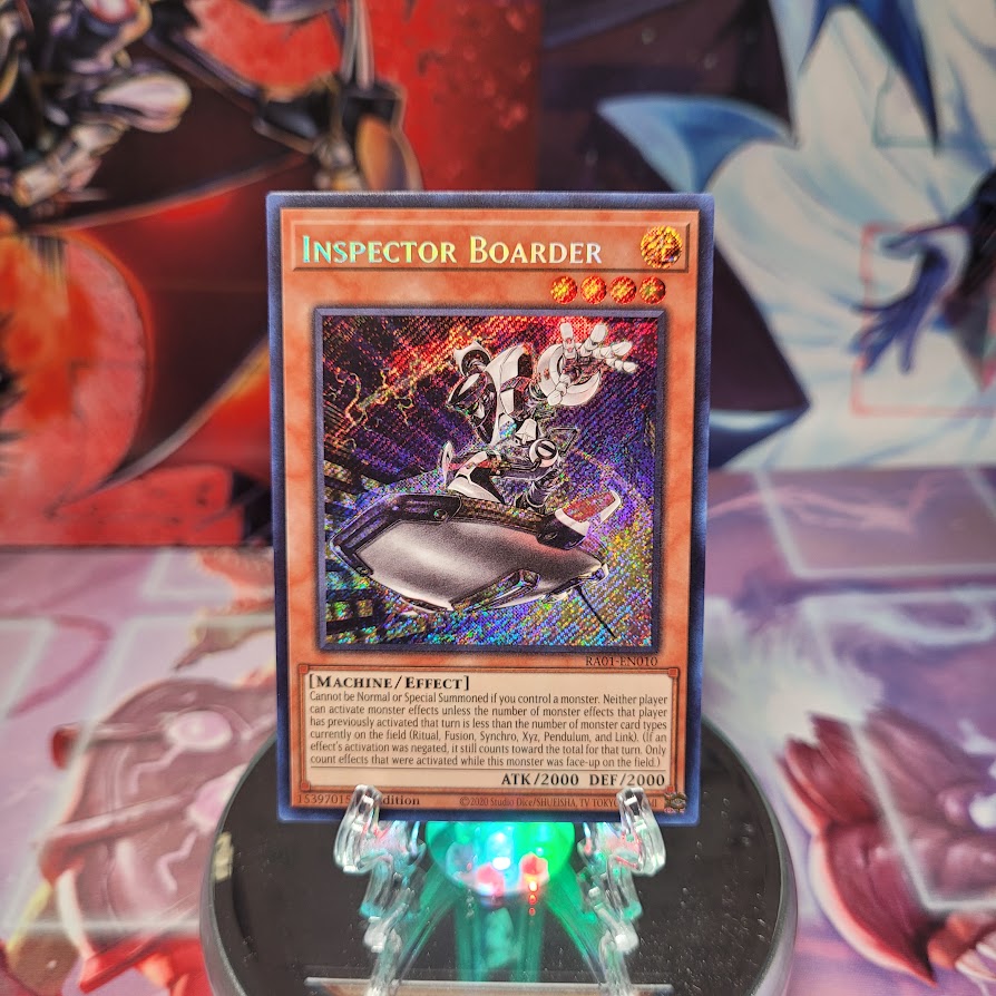 A Secret Rare "Inspector Boarder" card from the Yugioh Set: Rarity Collection 1 (RA01).