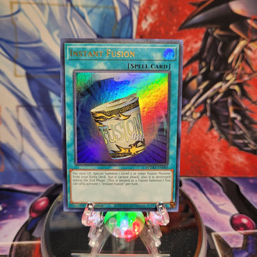 An Ultra Rare "Instant Fusion" card from the Yugioh Set: Magnificent Mavens.