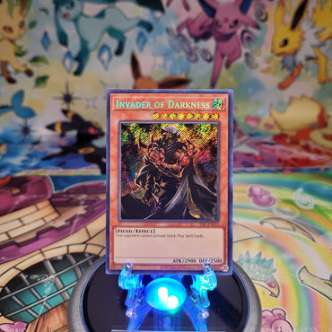 A Secret Rare "Invader of Darkness" card from the Yugioh Set: Invasion of Chaos 25th Anniversary Edition (IOC).