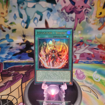 An Ultra Rare “Invocation - Sword” card from the Yugioh Set: Chaos Origins (CORI).