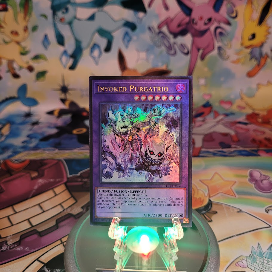 An Ultra Rare "Invoked Purgatrio" card from the Yugioh Set: Battles of Legend: Glorious Gallery (BLGG).