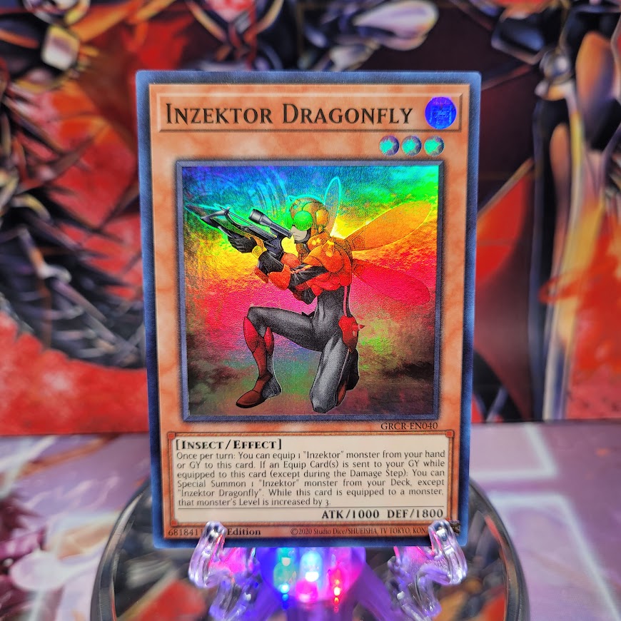  A Super Rare "Inzektor Dragonfly" card from the Yugioh Set: The Grand Creators.