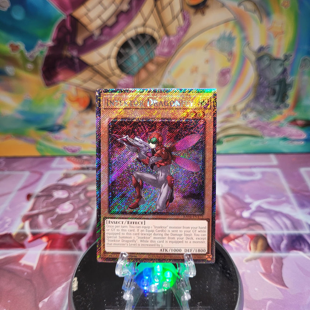 A Platinum Secret Rare "Inzektor Dragonfly" card from the Yugioh Set: Quarter Century Stampede (RA04).