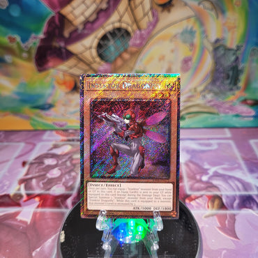 A Platinum Secret Rare "Inzektor Dragonfly" card from the Yugioh Set: Quarter Century Stampede (RA04).