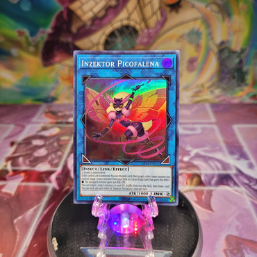 A Super Rare "Inzektor Picofalena" card from the Yugioh OTS Tournament Pack 18 set.