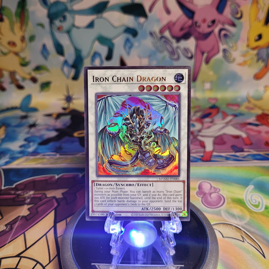 An Ultra Rare "Iron Chain Dragon" card from the Yugioh Set: Magnificent Monsters (MAMO).