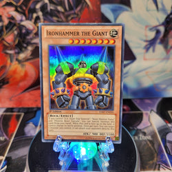 A Super Rare "Ironhammer the Giant" card from the Yugioh Set: Hidden Arsenal 7: Knight of Stars.