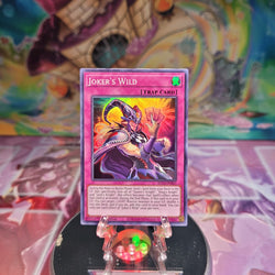 A Super Rare "Joker's Wild" card from the Yugioh Set: King's Court.