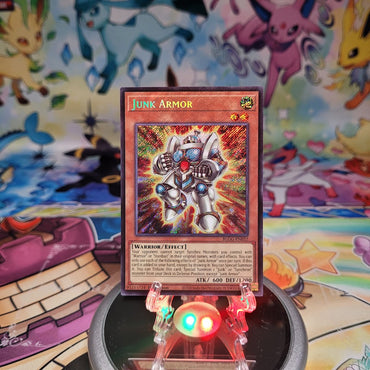 A Secret Rare "Junk Armor" card from the Yugioh Set: Battles of Legend: Glorious Gallery (BLGG).
