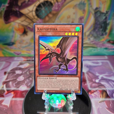 A Super Rare "Kaitoptera" card from the Yugioh Set: Maze of Millennia (MZMI).