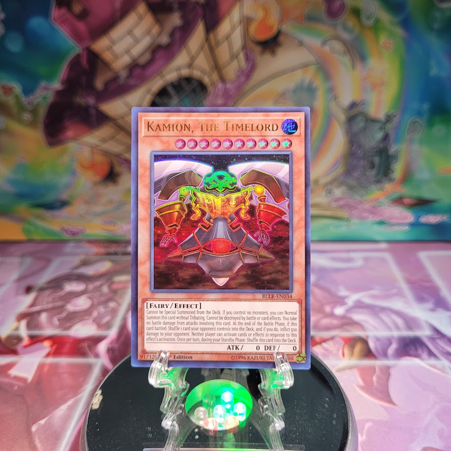 An Ultra Rare "Kamion, the Timelord" card from the Yugioh Set: Battles of Legend: Relentless Revenge.