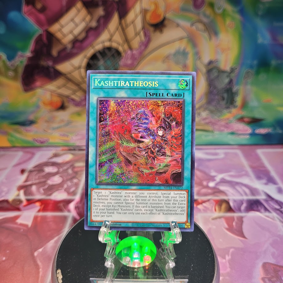 A Prismatic Secret Rare "Kashtiratheosis" card from the Yugioh Set: 25th Anniversary Tin: Dueling Mirrors.