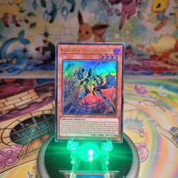 An Ultra Rare "Keeper of Dragon Magic" card from the Yugioh Structure Deck: The Fallen & The Virtuous (CH01).
