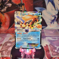 A Black Star Promo "Keldeo Ex" (BW61) card.
