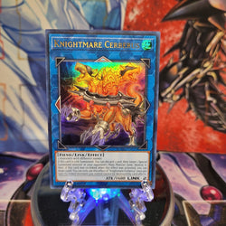 An Ultra Rare "Knightmare Cerberus" card from the Yugioh Set: Magnificent Mavens.